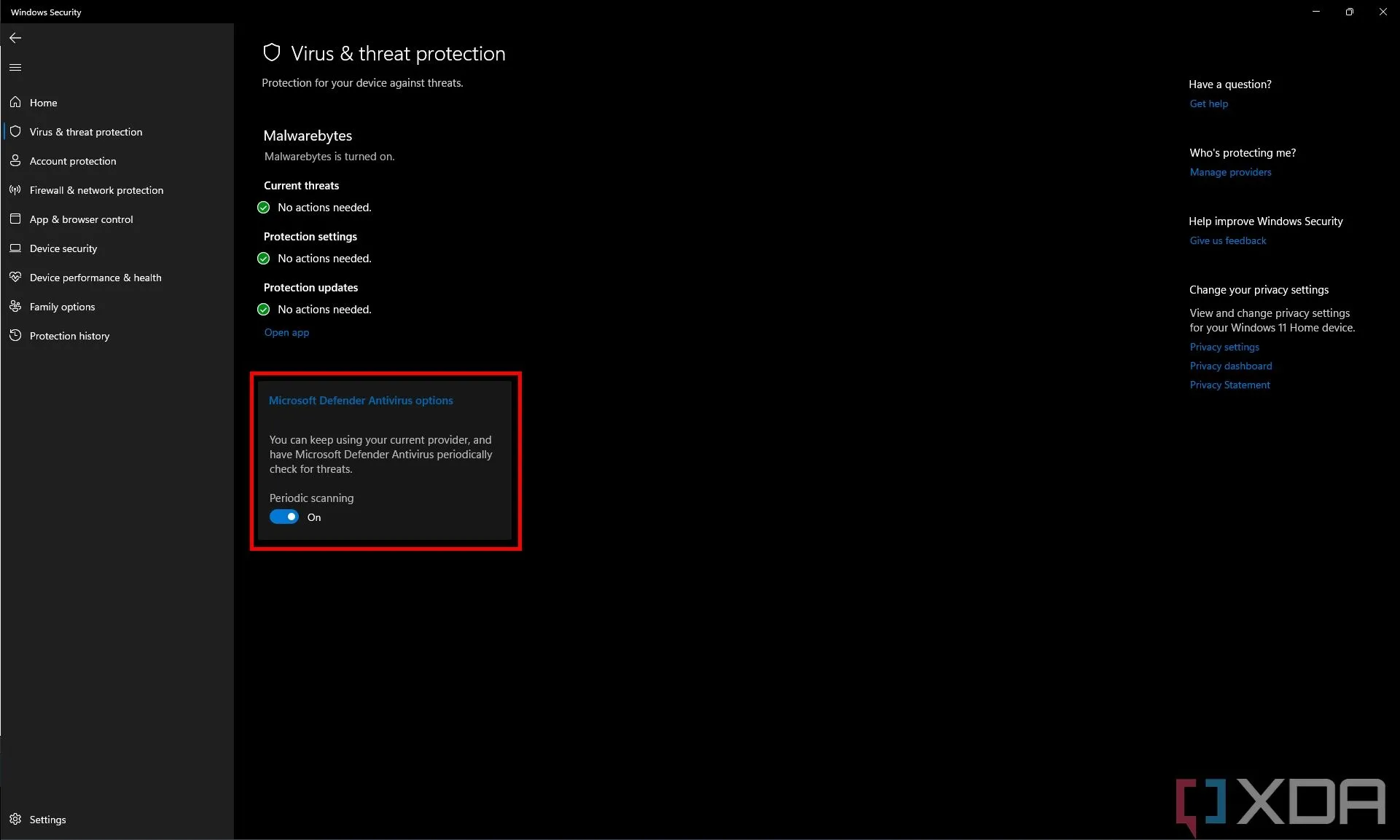 Cài đặt bảo vệ khỏi virus và mối đe dọa trong Microsoft Defender, hiển thị tùy chọn quét định kỳ khi có phần mềm diệt virus khác.