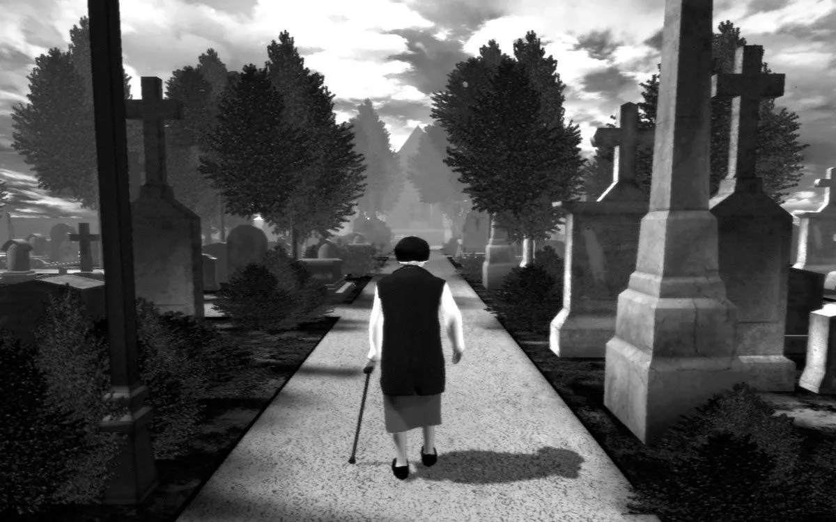 Ảnh chụp màn hình từ trò chơi The Graveyard, thể hiện một bà lão đang đi bộ qua nghĩa địa với bia mộ và cây cối.