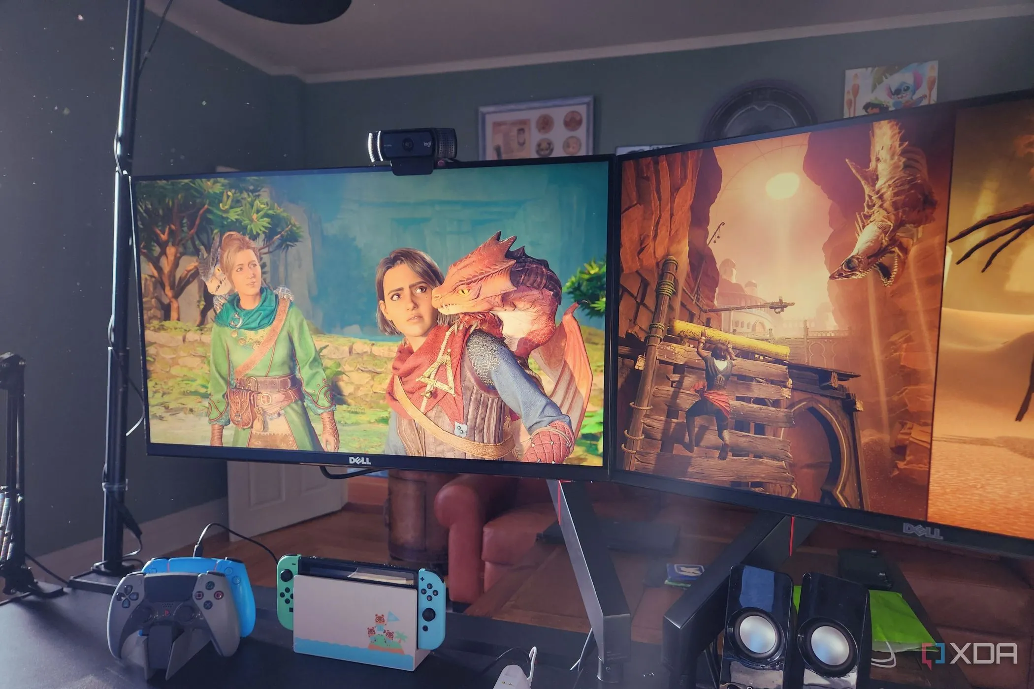 Các nhân vật Split Fiction phản ứng với rồng trên màn hình máy tính chơi game, thể hiện trải nghiệm co-op