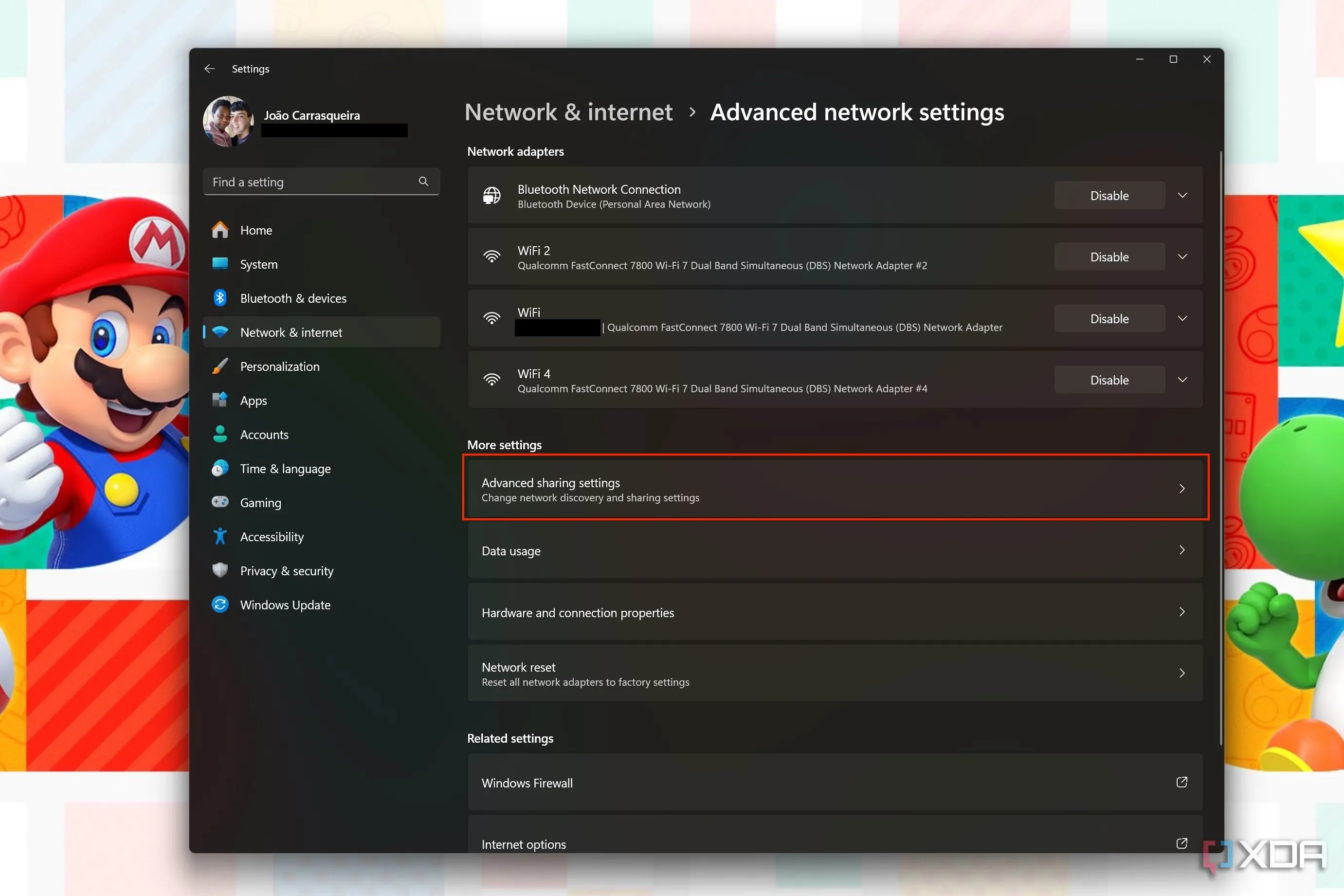 Cài đặt mạng nâng cao của Windows 11, với nút &quot;Cài đặt chia sẻ nâng cao&quot; được làm nổi bật.