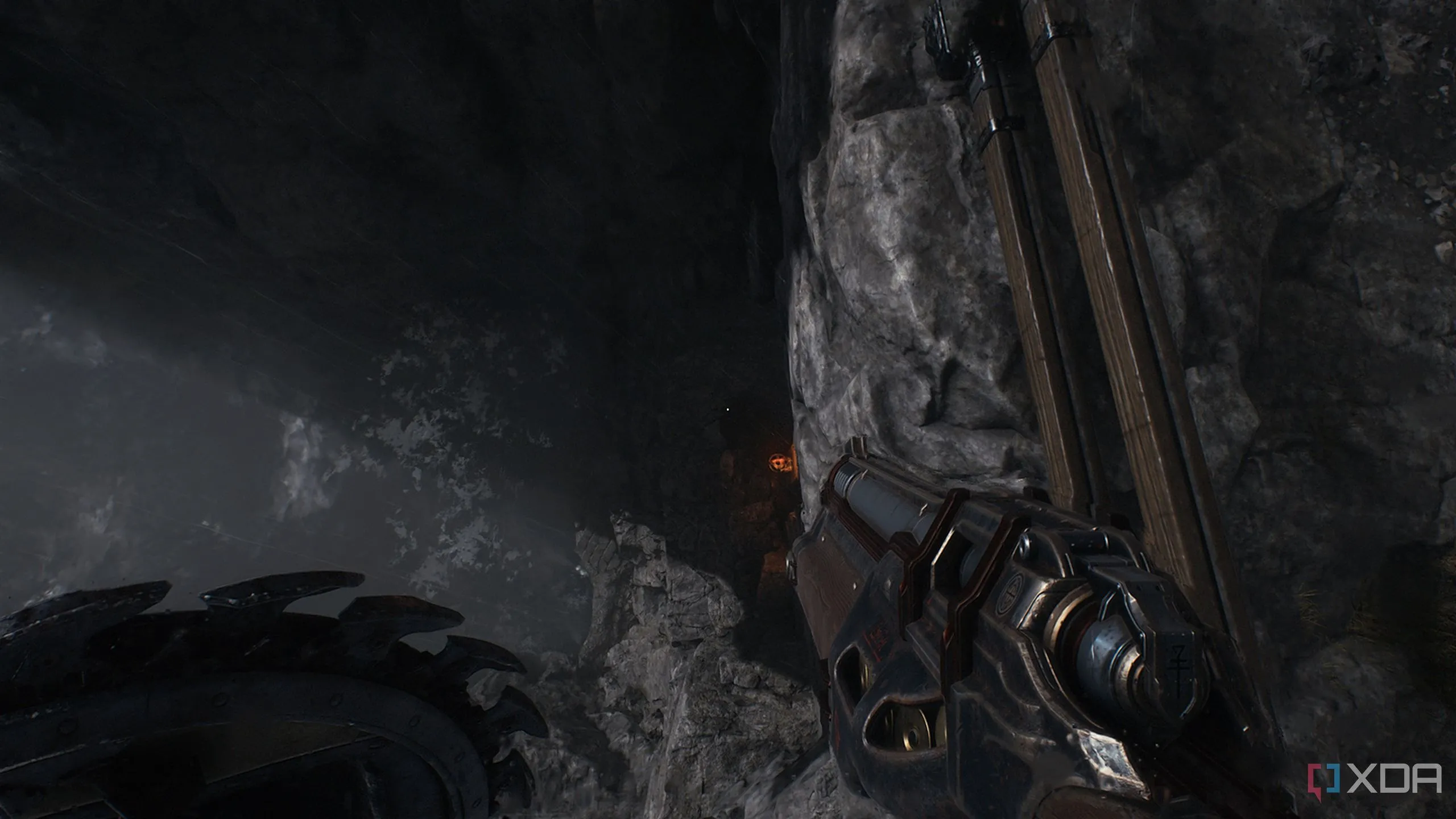 Dòng nước chảy dưới vách đá, lối vào bí mật dẫn đến Weapon Skin trong Doom The Dark Ages