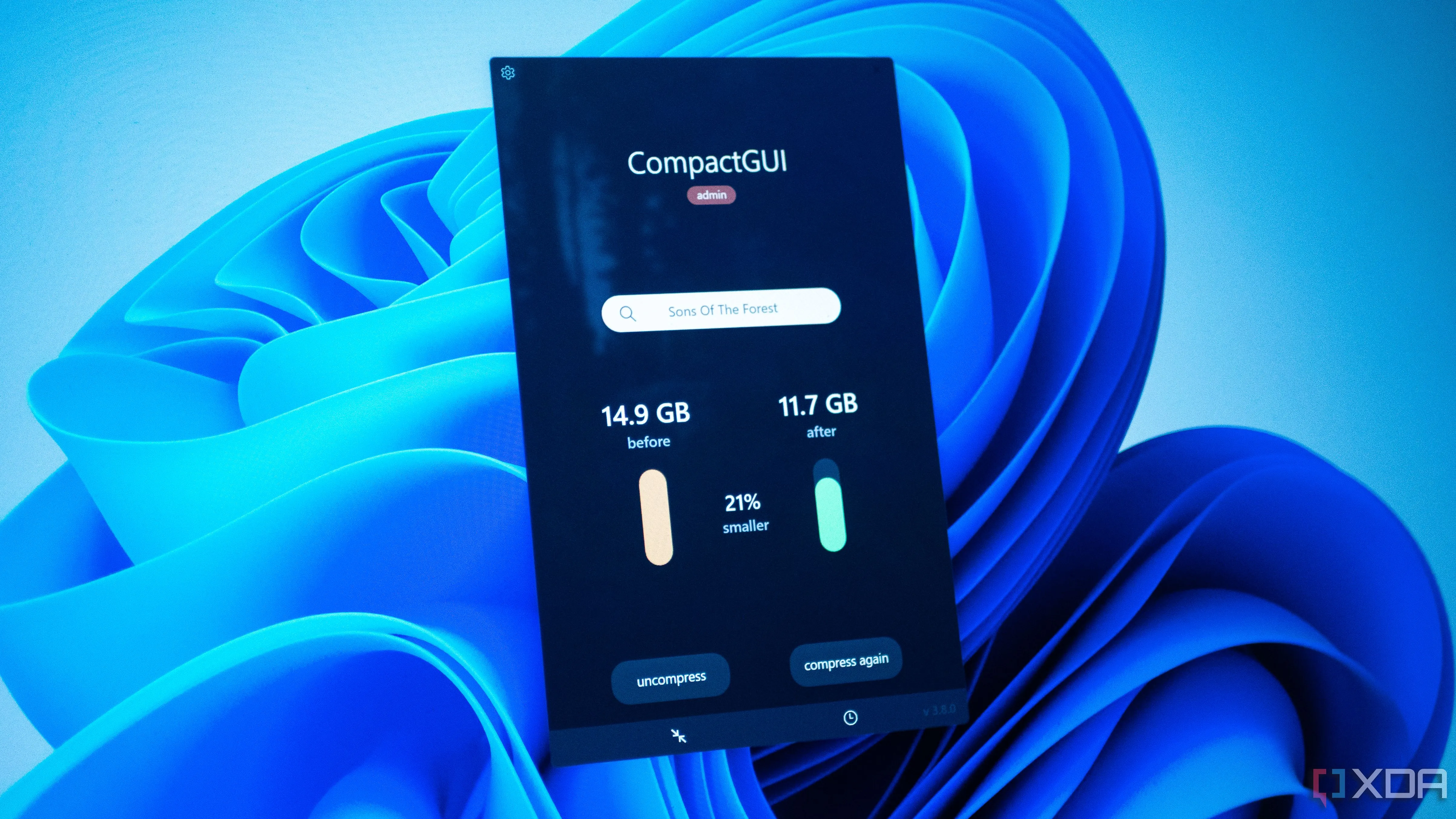 Giao diện CompactGUI trên Windows 11, hiển thị game Sons of the Forest đã được nén giảm 21% dung lượng
