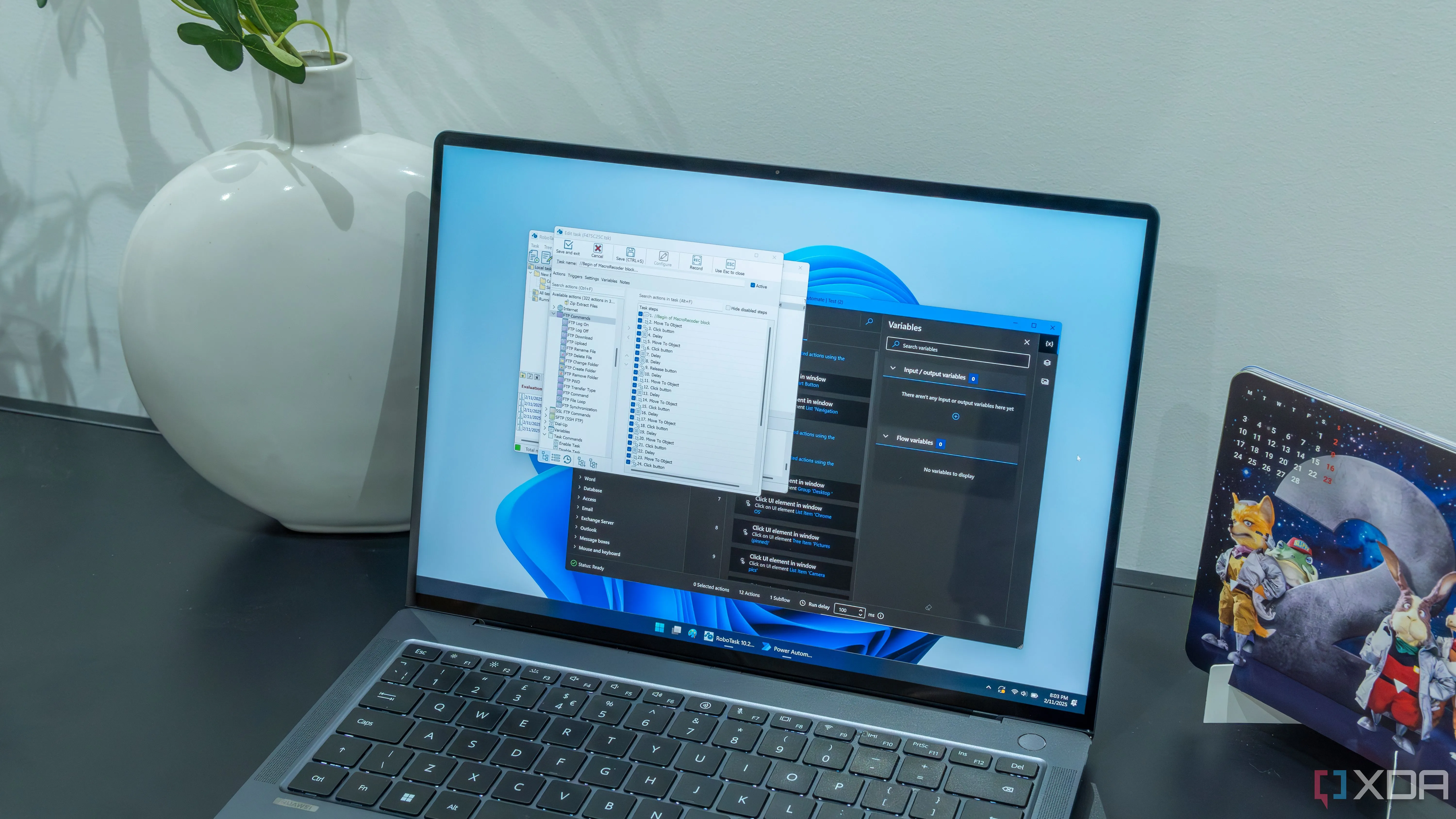Giao diện máy tính Windows 11 với các ứng dụng tự động hóa như RoboTask và Power Automate đang chạy, minh họa môi trường làm việc cần công cụ giám sát tiến trình hiệu quả
