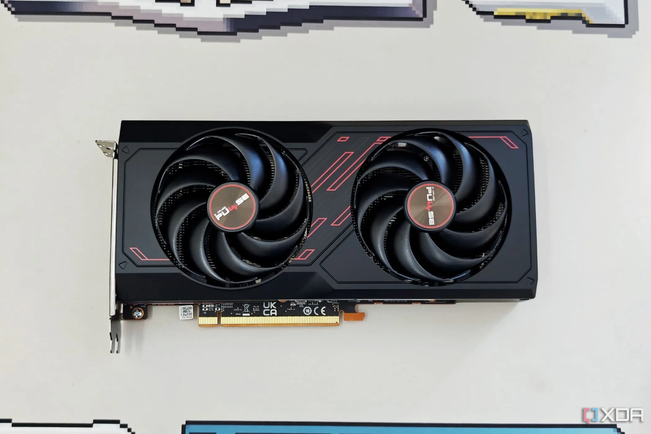 Hình ảnh card đồ họa Sapphire Radeon RX 7600 XT Pulse OC, điển hình cho các lựa chọn VRAM của AMD