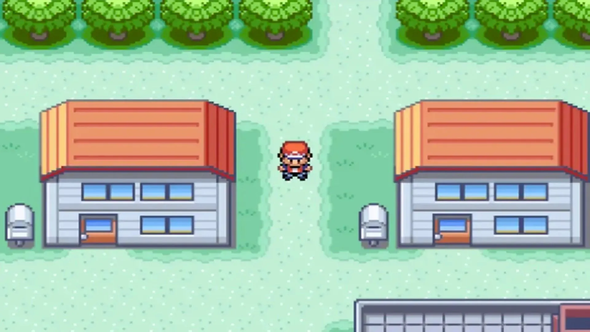 Màn hình chơi game Pokémon FireRed trên Game Boy Advance, người chơi đang khám phá một thị trấn trong thế giới Kanto.