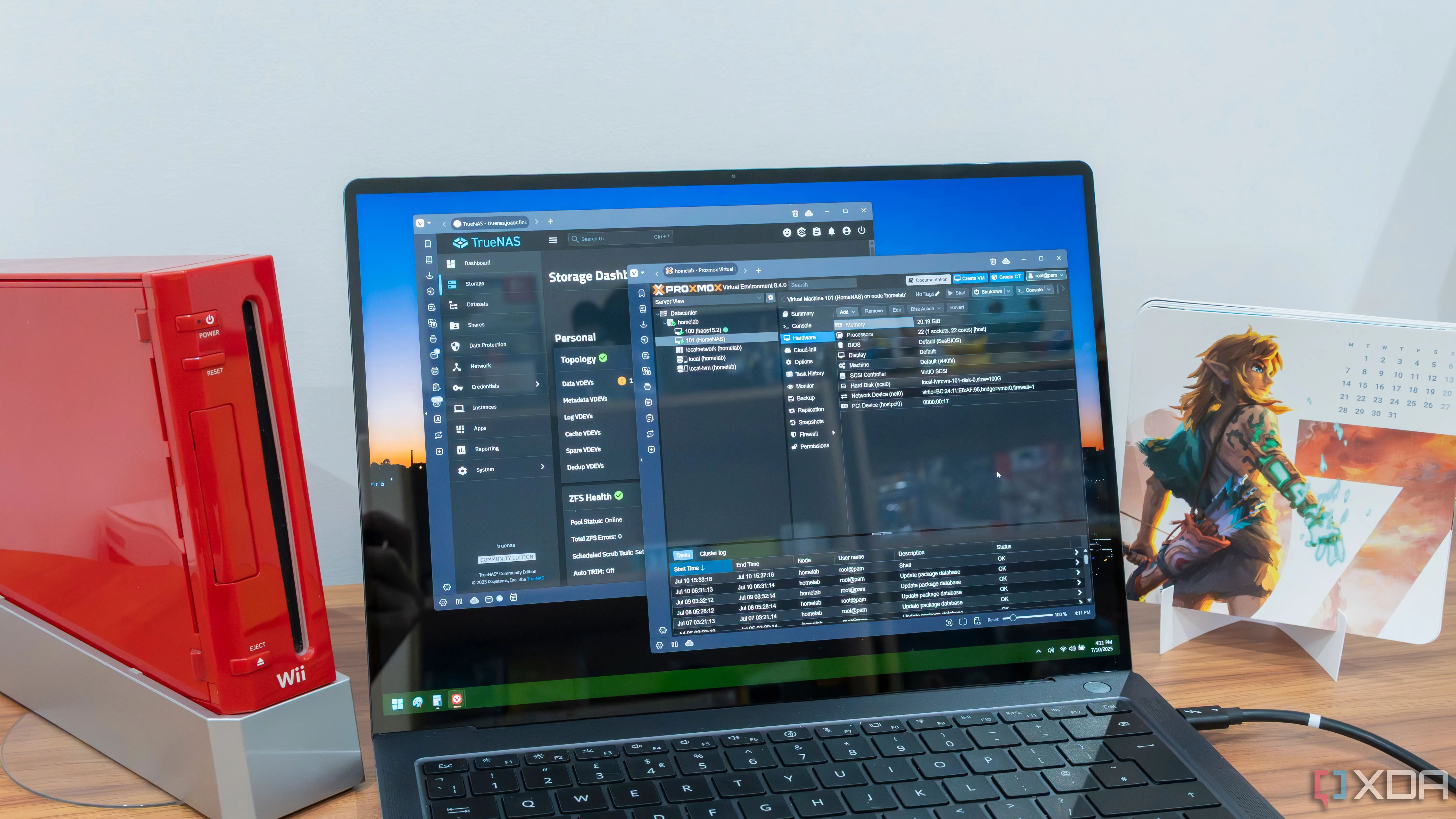 Màn hình laptop Windows 11 hiển thị giao diện quản lý TrueNAS và Proxmox, minh họa một home lab điển hình