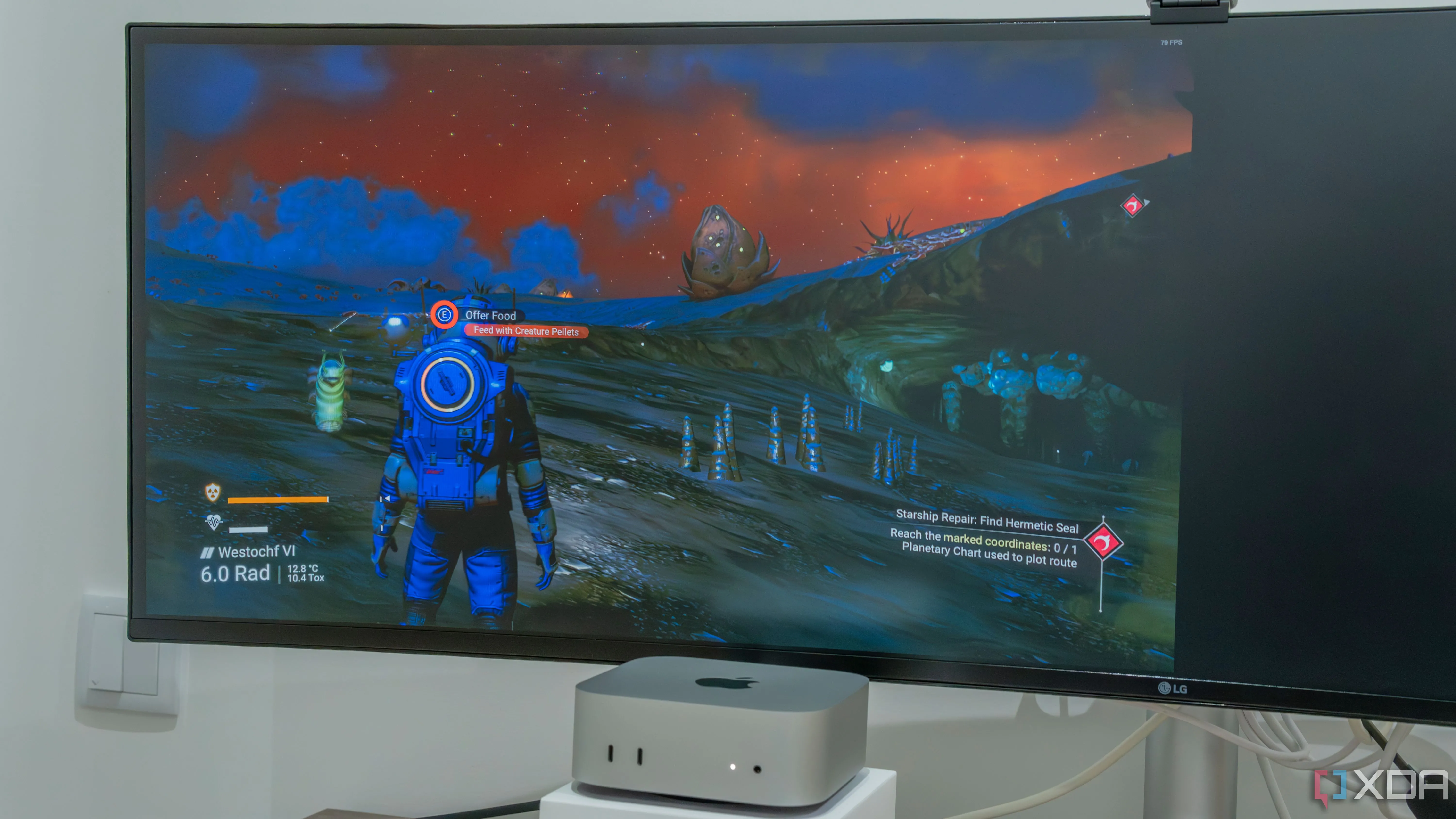 Màn hình máy tính Mac Mini hiển thị trò chơi No Man's Sky, minh họa cho game dịch vụ thành công.