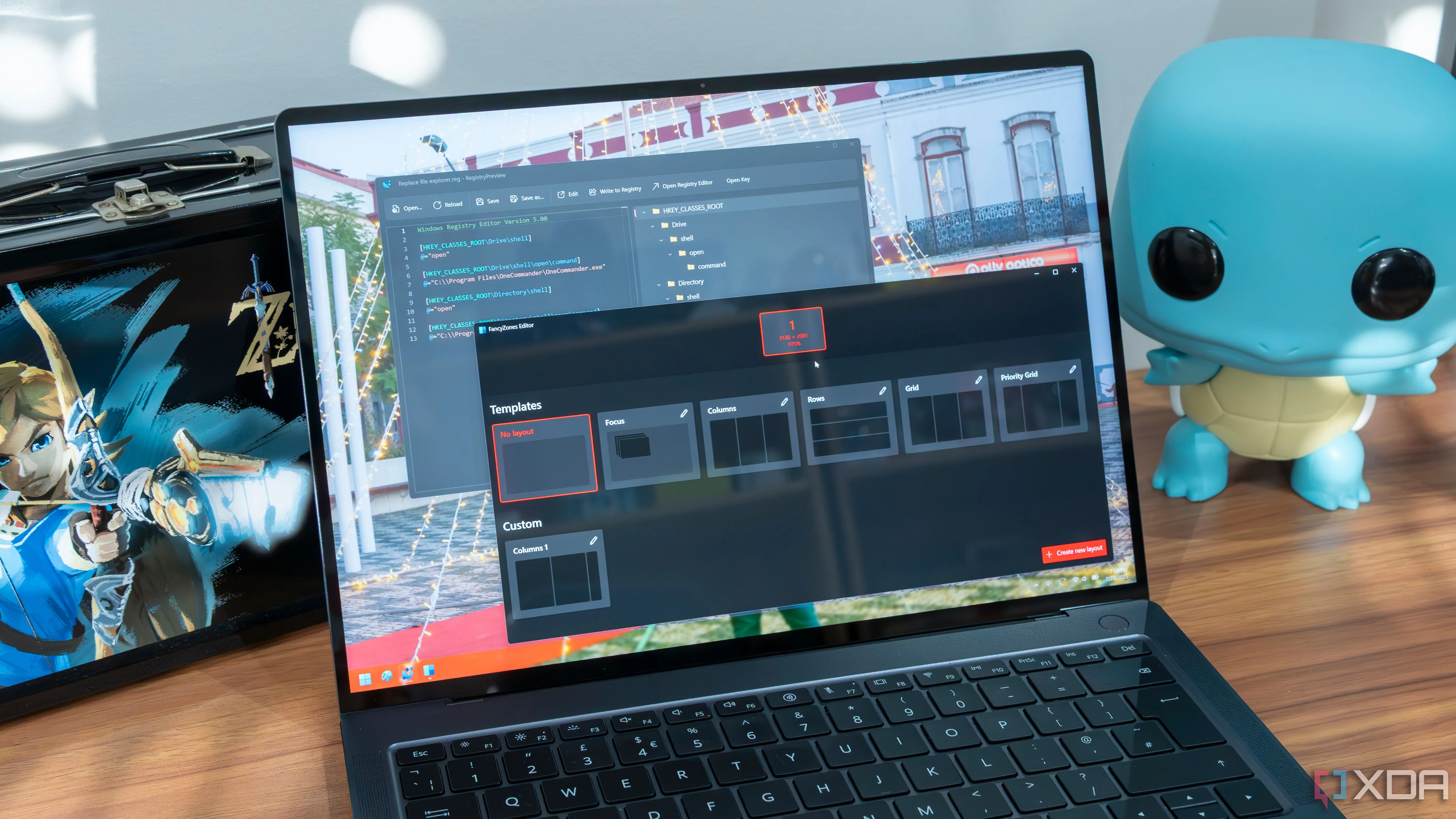 Màn hình Windows 11 hiển thị các công cụ PowerToys như Registry preview và FancyZones, minh họa khả năng xem trước tệp.
