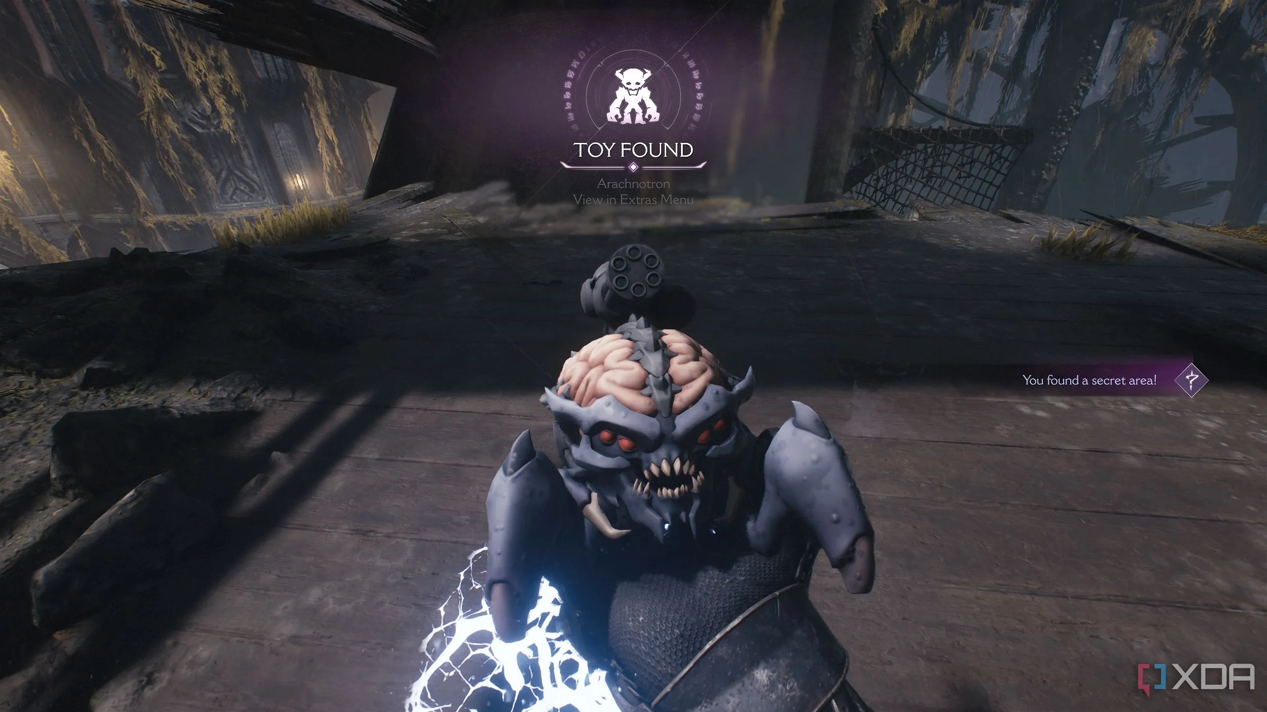 Mô hình đồ chơi quỷ Arachnotron là vật phẩm sưu tầm trong Chương 14 của Doom: The Dark Ages.