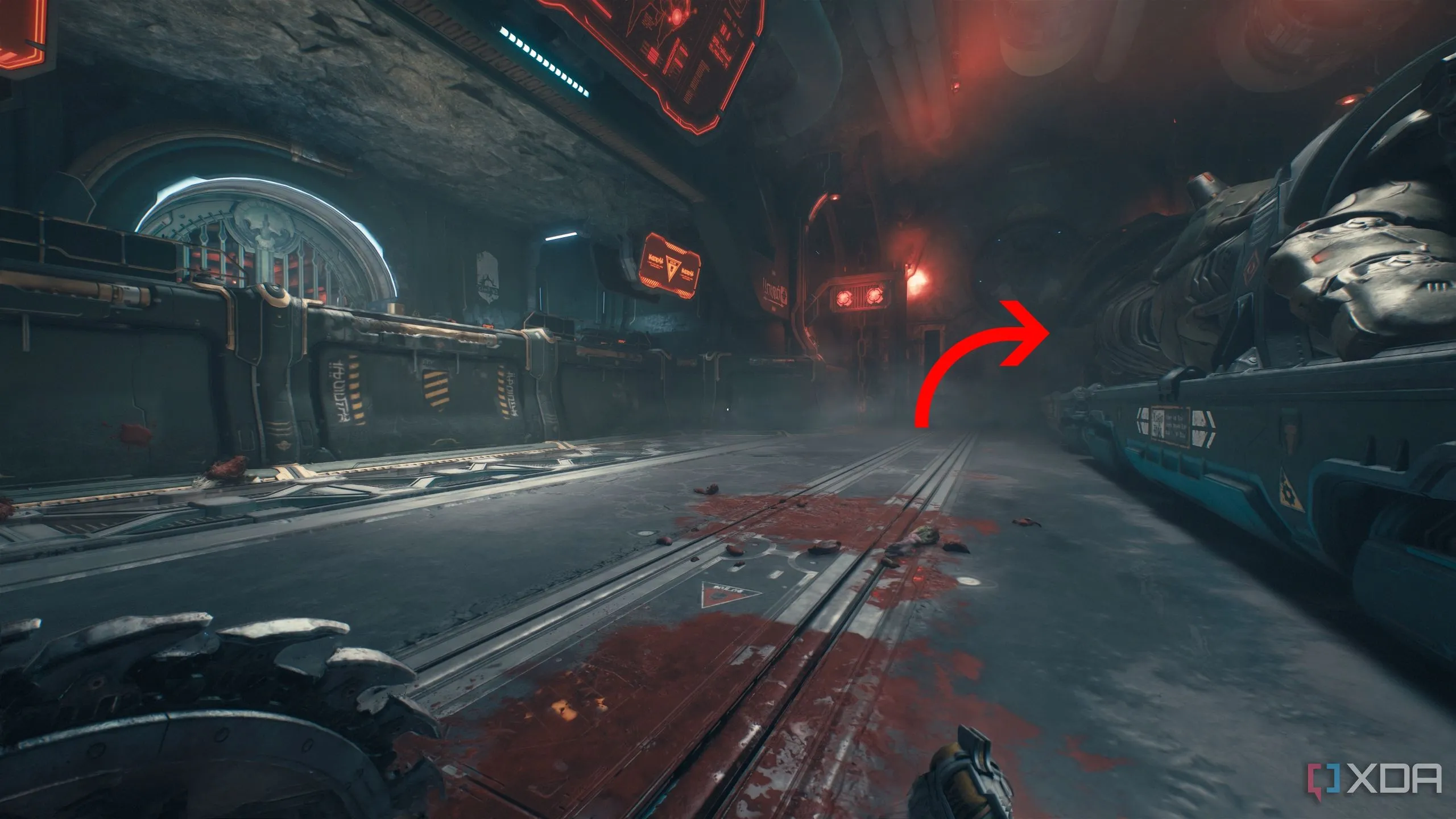 Mũi tên chỉ vào góc tối, nơi ẩn chứa một chồng vàng bí mật trong Khu vực bí mật 2, Doom The Dark Ages.