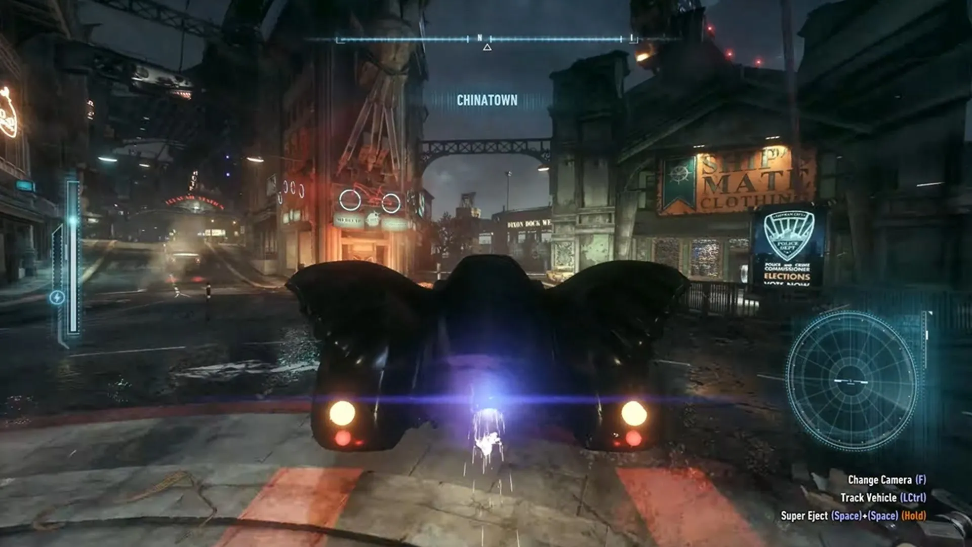 Người Dơi chiến đấu giữa các tòa nhà cao tầng trong Batman Arkham Knight, minh họa các chi tiết cảnh quan phong phú