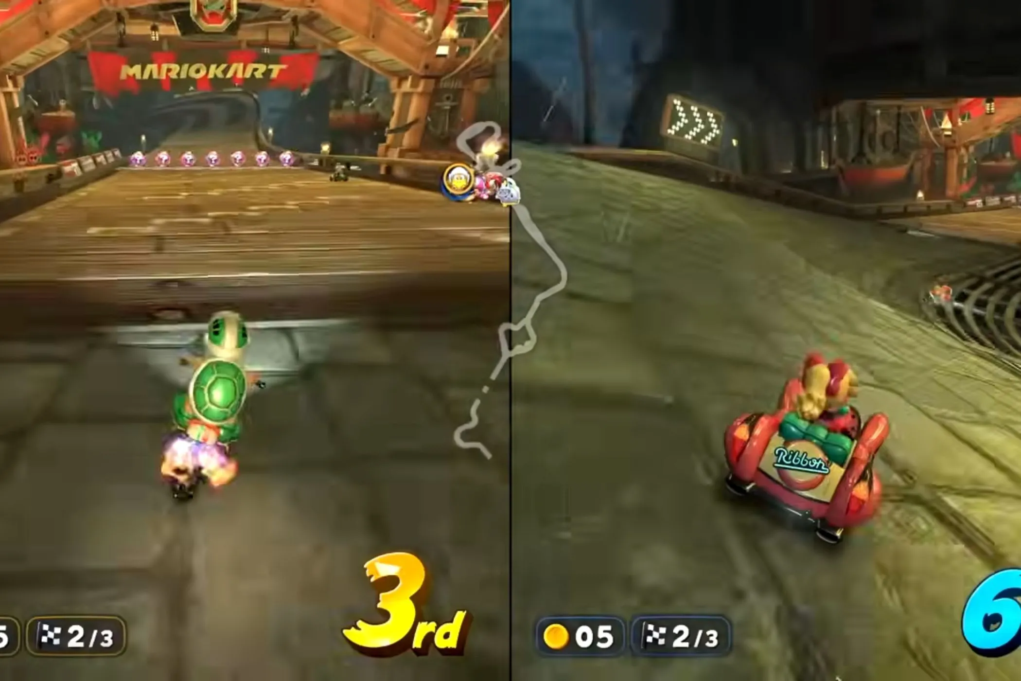 Nhân vật Koopa và Peach đua trên đường Wario Shipyard của Mario Kart World