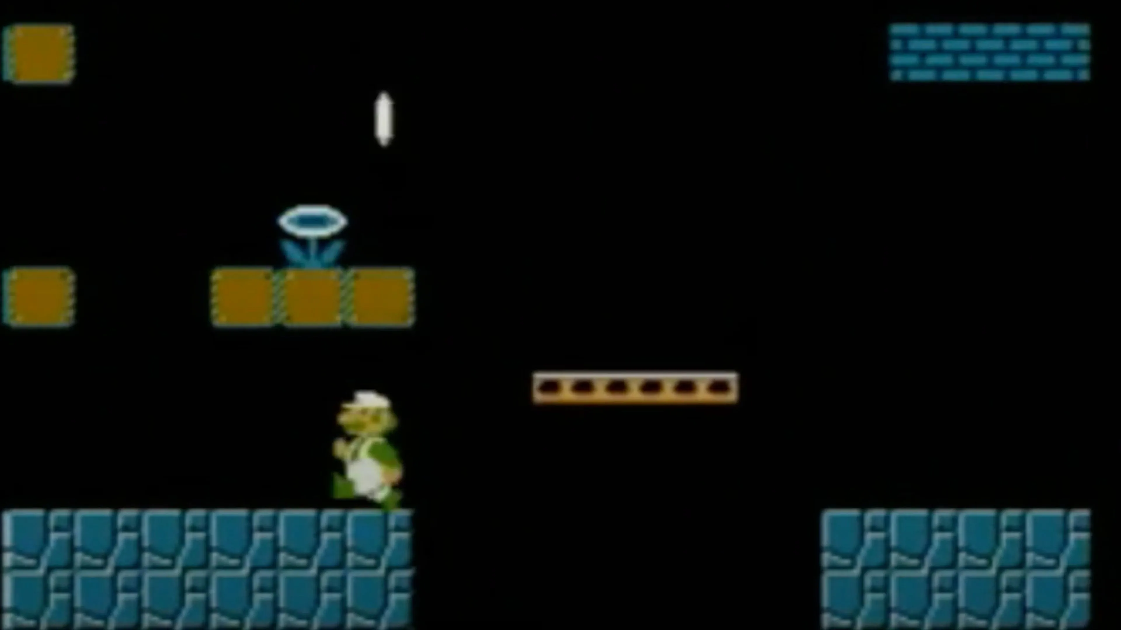 Screenshot trong game Super Mario Bros. với Luigi đang di chuyển qua màn chơi