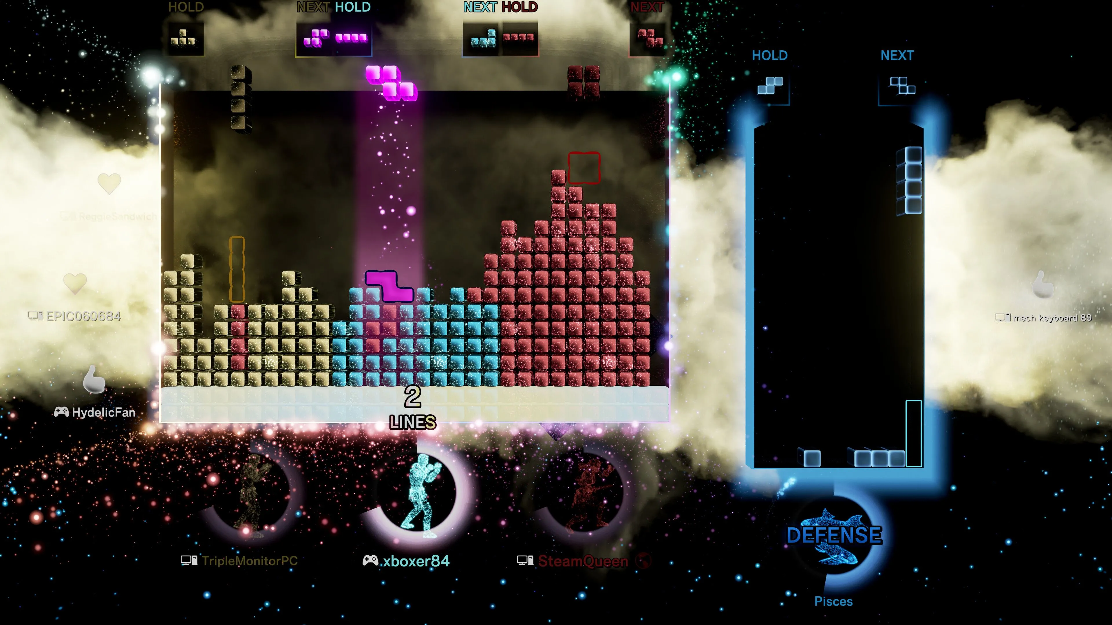 Screenshot từ game Tetris Effect với một bảng Tetris lớn và một bảng nhỏ hơn